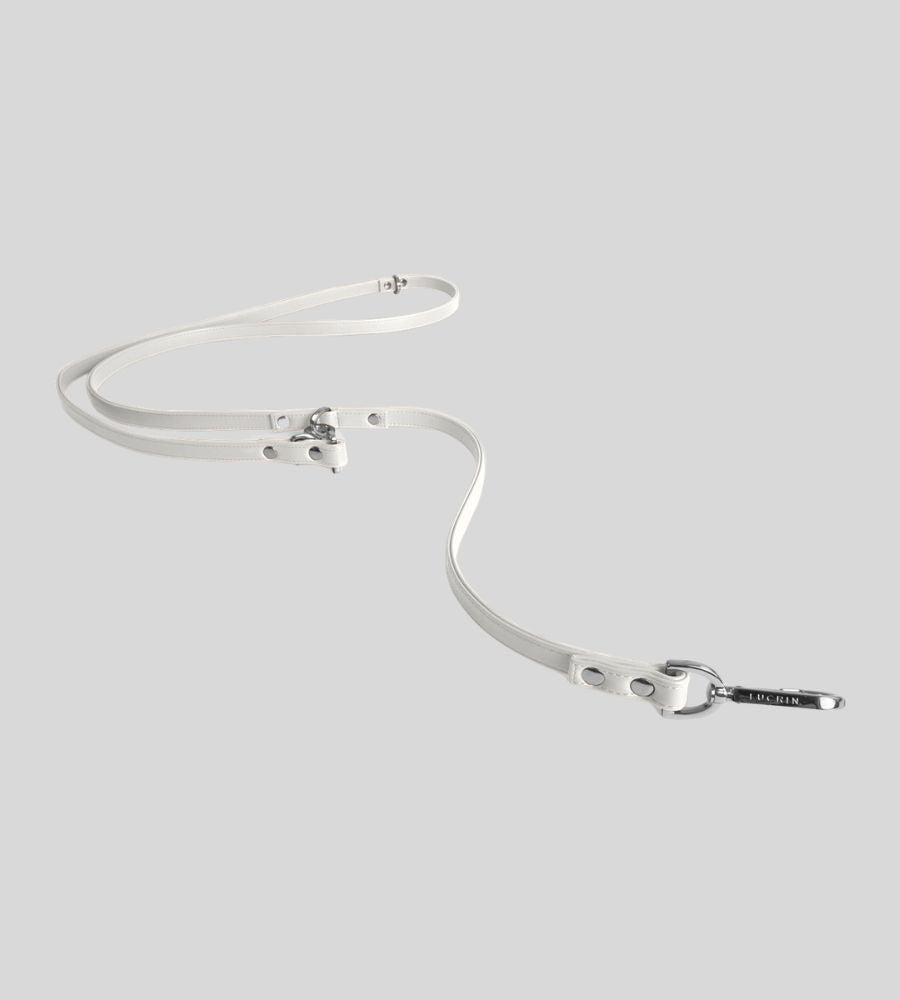 Extended white leather dog leash with silver clasp