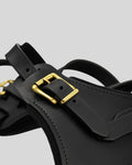 Close-up of under-belly secure strap on cushioned leather dog harness