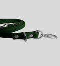 Close-up clasp detail on premium dark green leather dog leash