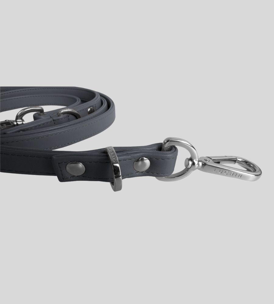 Close-up clasp detail on premium grey leather dog leash