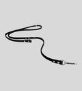 Extended black leather leash showing adjustable training rings