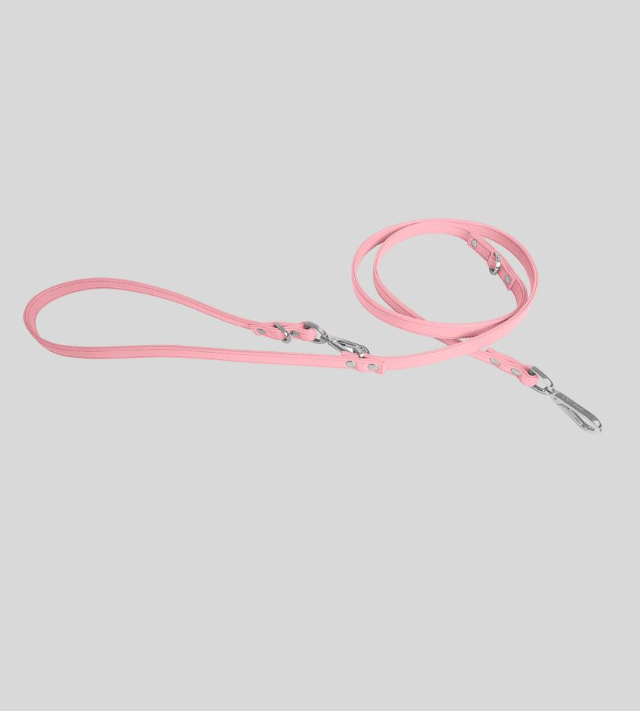 Coiled pink leather leash with silver hardware