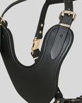 Close-up side angle showing adjustable strap and brass buckle details

