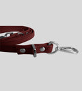 Close-up clasp detail on premium burgundy leather dog leash
